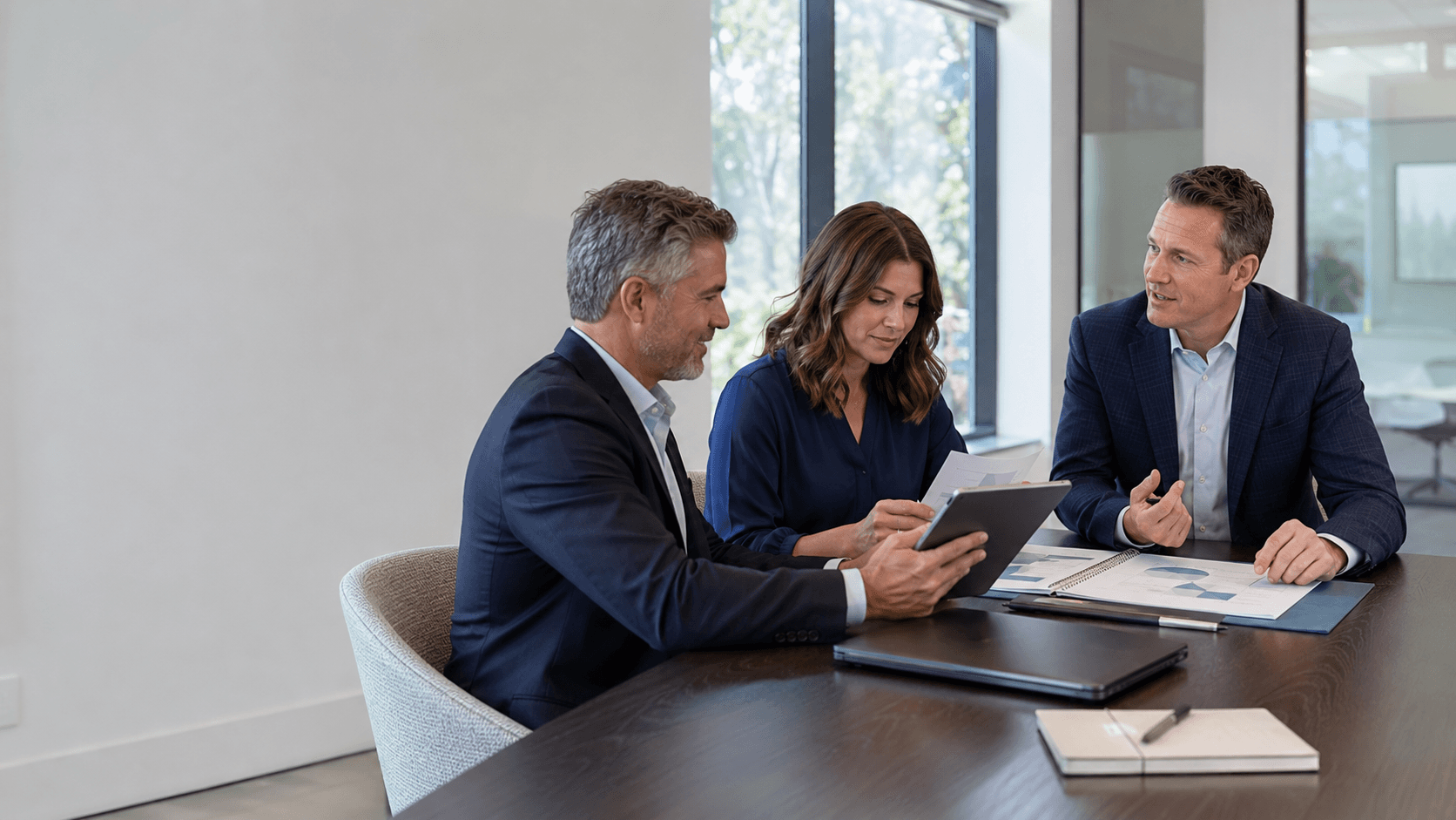 Financial advisors reviewing a client education plan
